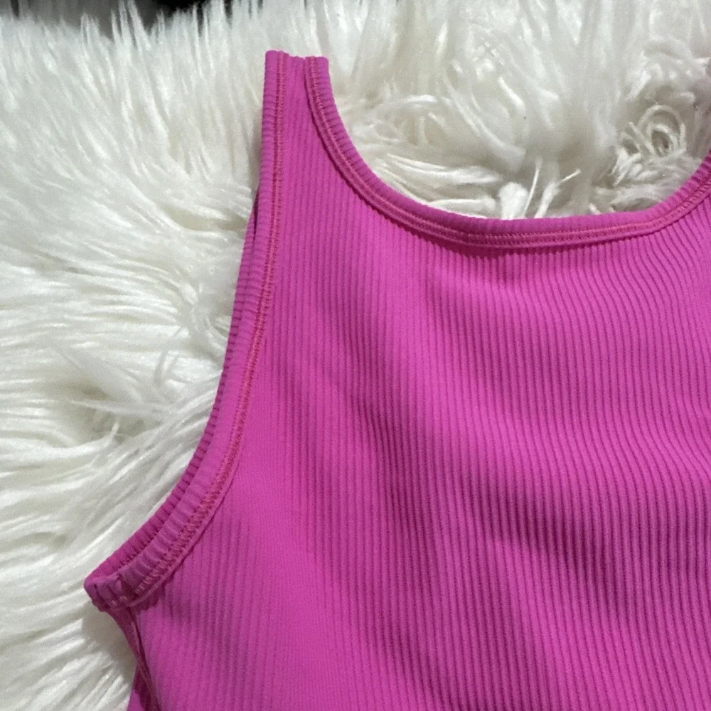 $58 Lululemon Power Pivot Ribbed Tank Top in Sonic Pink Size 4